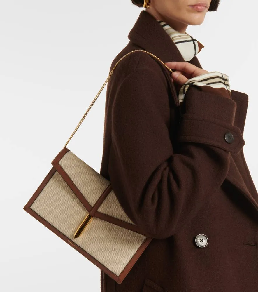 DeMellier Tokyo leather-trimmed canvas clutch